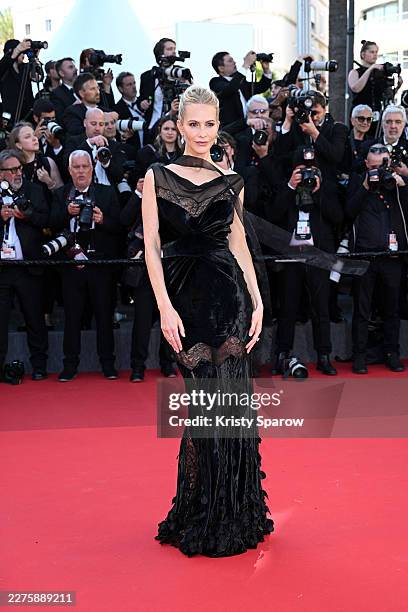 Poppy Delevingne attends the opening ceremony and "La Vénus Electrique" screening during the 79th annual Cannes Film Festival at Palais des Festivals...