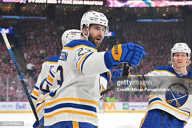 Mattias Samuelsson of the Buffalo Sabres celebrates with teammates after scoring a goal against the Montreal Canadiens during the first period in...
