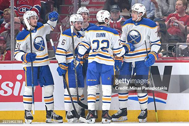 Tage Thompson of the Buffalo Sabres celebrates with teammates after scoring a goal against the Montreal Canadiens during the second period in Game...