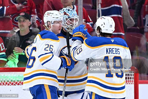 Rasmus Dahlin, Ukko-Pekka Luukkonen, and Peyton Krebs of the Buffalo Sabres celebrate after the 3-2 victory against the Montreal Canadiens in Game...
