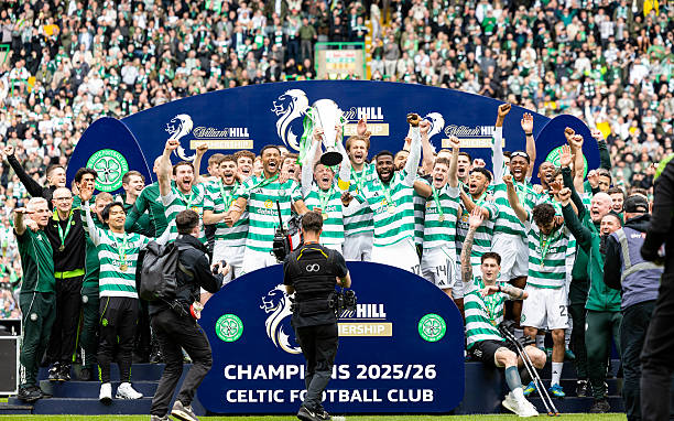 Celtic's Callum McGregor lifts the William Hill Premiership trophy during a William Hill Premiership match between Celtic and Heart of Midlothian at...