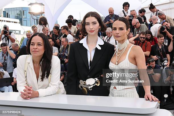 Jordana Brewster, Meadow Walker and Michelle Rodriguez pose during "The Fast And The Furious" 25th Anniversary photocall at the 79th annual Cannes...