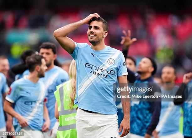 Manchester City's Rodri celebrates his sides victory over Chelsea following the Emirates FA Cup final at Wembley Stadium, London. Picture date:...