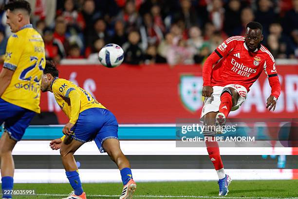 Benfica's Belgian forward Dodi Lukebakio shoots during the Portuguese League football match between GD Estoril Praia and SL Benfica at the Antonio...
