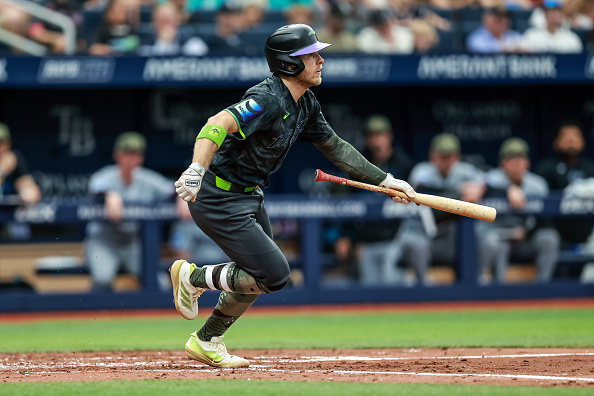 Miami Rays Taylor Walls of the Tampa Bay Rays doubles against the Miami Marlins ...
