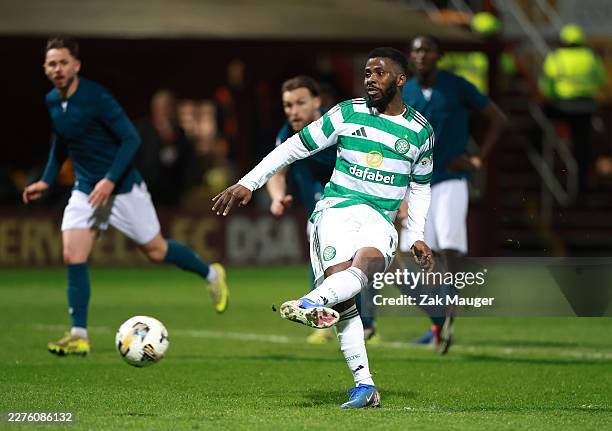 Kelechi Iheanacho of Celtic scores his team's third goal from the penalty spot during the William Hill Premiership match between Motherwell and...