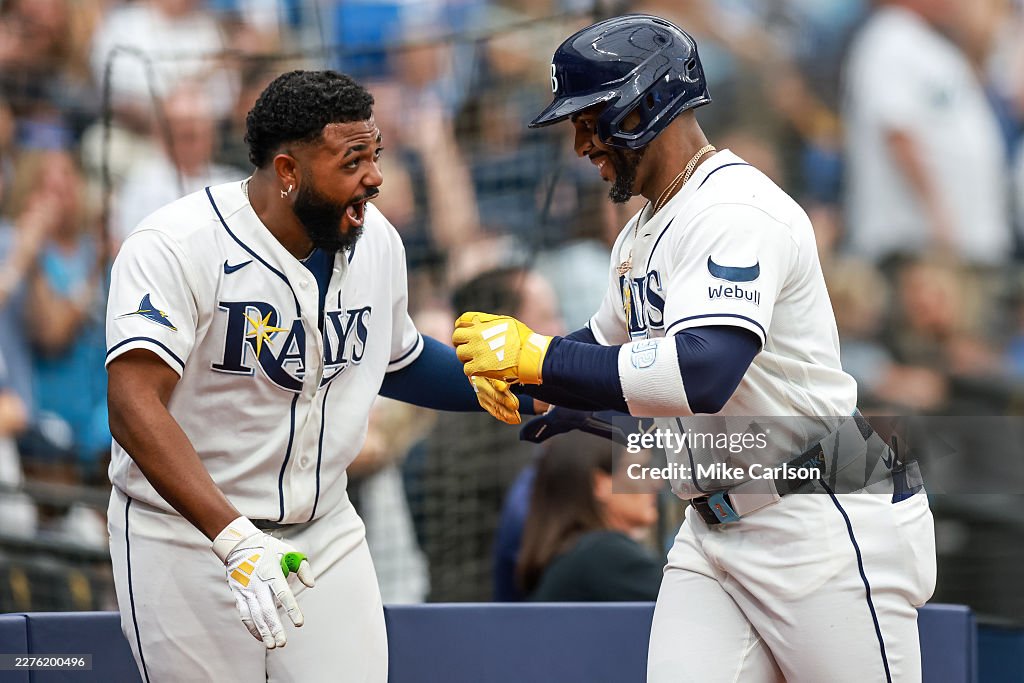 Miami Rays Junior Caminero of the Tampa Bay Rays congratulates teammate Yandy ...