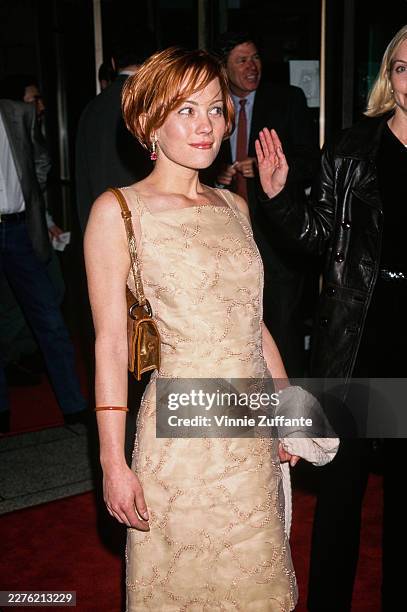 American actress Natasha Gregson Wagner, wearing a champagne-coloured dress with gold trim, attends the Hollywood premiere of 'Lost Highway' at the...