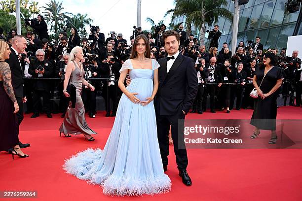 Barbara Palvin and Dylan Sprouse attend the "Histoires Parallèles " screening during the 79th annual Cannes Film Festival at Palais des Festivals on...
