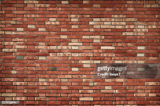 red and beige brick wall texture background - red brick stock illustrations
