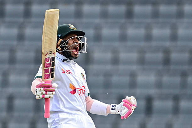 Bangladesh's Mushfiqur Rahim celebrates after scoring a century during the third day of the second Test cricket match between Bangladesh and Pakistan...