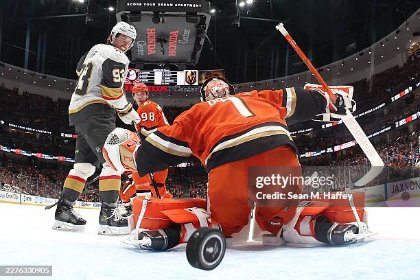 Lukas Dostal and Pavel Mintyukov of the Anaheim Ducks are unable to stop a goal by Pavel Dorofeyev as Mitch Marner of the Vegas Golden Knights looks...