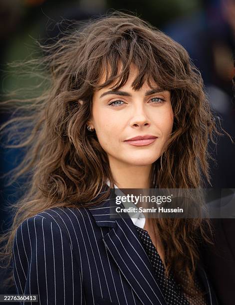 Cara Delevingne poses during the "Club Kid" photocall at the 79th annual Cannes Film Festival at Palais des Festivals on May 15, 2026 in Cannes,...