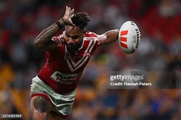 Hamiso Tabuai-Fidow of the Dolphins celebrates scoring a try during the round 11 NRL match between South Sydney Rabbitohs and Dolphins at Suncorp...