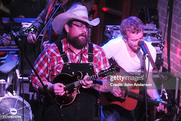 American Folk & Bluegrass musicians Erik Berry , on mandolin, and Dave Simonett, on acoustic guitar, both of the group Trampled by Turtles, perform,...