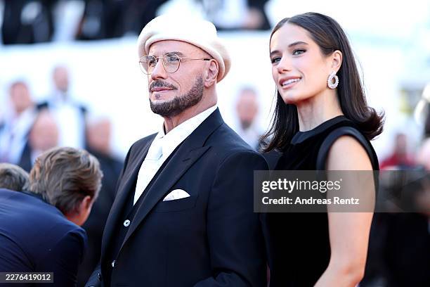 John Travolta and Ella Bleu Travolta attend the "Karma" screening during the 79th annual Cannes Film Festival at Palais des Festivals on May 15, 2026...