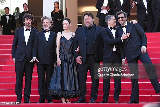 Simon Jacquet, Leonardo Sbaraglia, Marion Cotillard, Denis Ménochet, Guillaume Canet and Yodelice attend the "Karma" screening during the 79th annual...