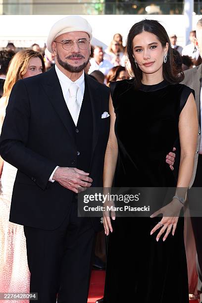 John Travolta and Ella Bleu Travolta attend the "Karma" screening during the 79th annual Cannes Film Festival at Palais des Festivals on May 15, 2026...