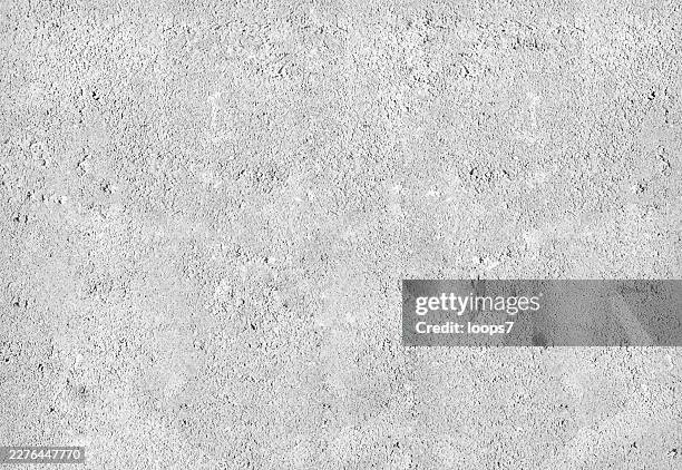 white rough concrete wall texture background - stone wall texture stock illustrations