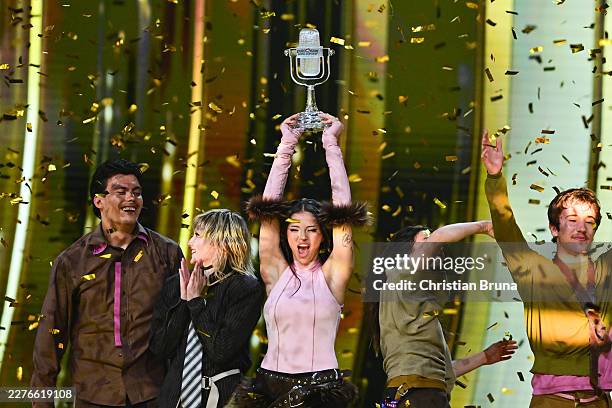 Representing Bulgaria with the song ‚Bangaranga‘, winner of the Eurovision Song Contest, celebrates on stage while holding the trophy during the...