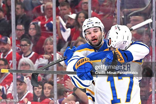 Jason Zucker celebrates a first period goal with Josh Norris of the Buffalo Sabres against the Montréal Canadiens in Game Six of the Second Round of...