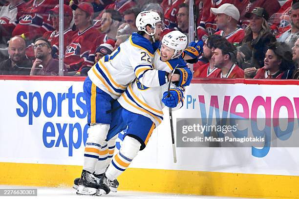 Konsta Helenius celebrates with Jack Quinn of the Buffalo Sabres after scoring a second period goal against the Montréal Canadiens in Game Six of the...