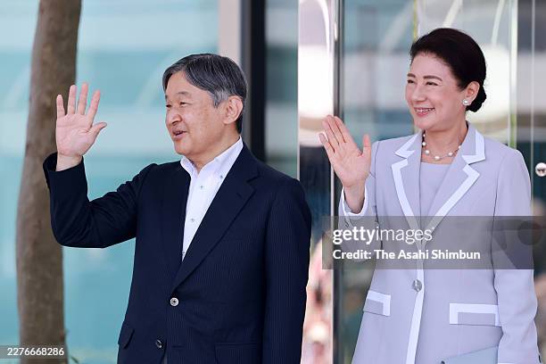 Emperor Naruhito and Empress Masako wave to well-wishers at Matsuyama Airport on May 16, 2026 in Matsuyama, Ehime, Japan.