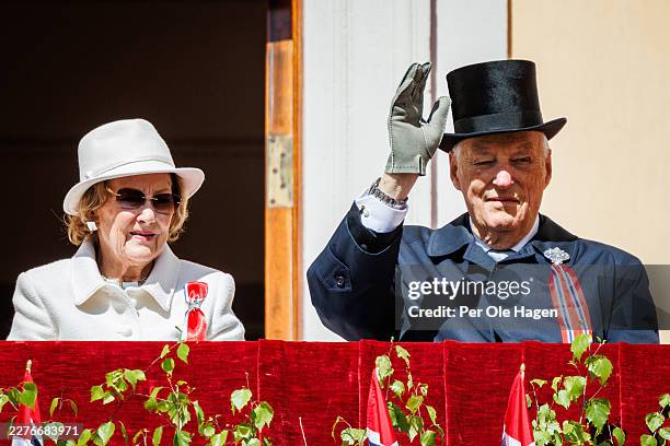 Her Majesty Queen Sonja of Norway and His Majesty King Harald of Norway attend the Norwegian Constitution Day with the children's parade at the Royal...