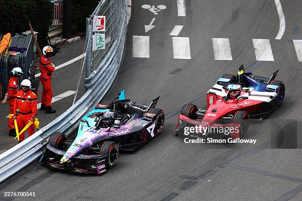 Dan Ticktum of Great Britain driving the CUPRA KIRO Porsche 99X Electric WCG3 leads Jean-Eric Vergne of France driving the Citroen Racing e-CX during...