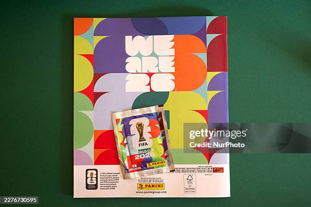 The back cover of the official Panini FIFA World Cup 2026 sticker album is displayed with a sticker packet in Palermo, Italy, on May 20 ahead of the...