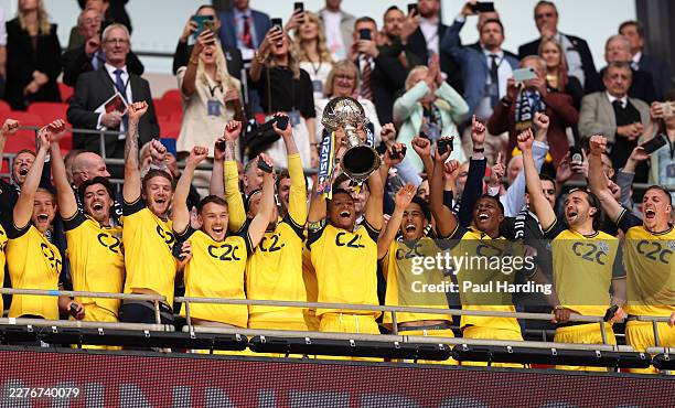 Nathan Ralph of Southend United lifts the Isuzu FA Trophy with teammates after winning the Isuzu FA Trophy Final between Southend United and...