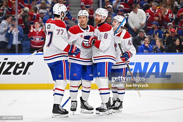 Zachary Bolduc of the Montréal Canadiens celebrates with teammates after scoring a goal against the Buffalo Sabres during the first period in Game...