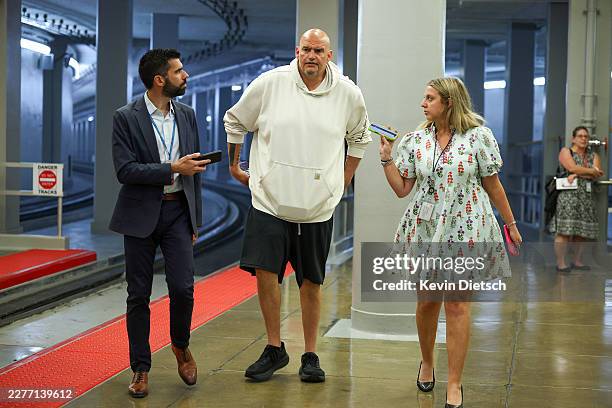 Sen. John Fetterman walks to the weekly Senate Policy Luncheon at the U.S. Capitol on May 19, 2026 in Washington, DC. Senate Republicans are planning...