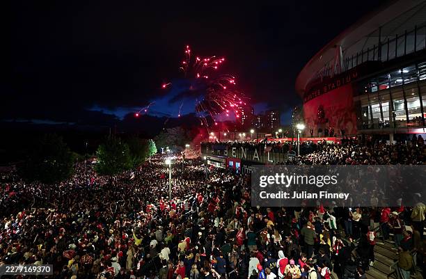 General view as fans of Arsenal celebrate as Arsenal are confirmed as Premier League champions following Manchester City's 1-1 draw against AFC...