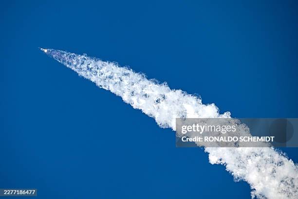 SpaceX's Starship 39 rocket launches from Starbase during the 12th test flight as seen from South Padre Island, Texas, on May 22, 2026. Elon Musk's...