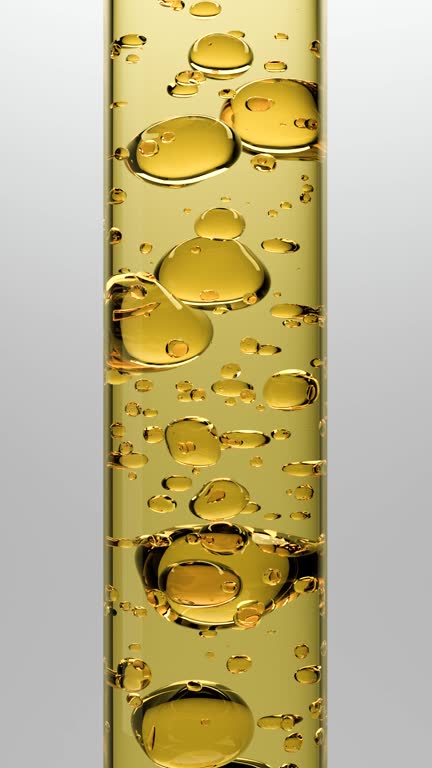 https://media.gettyimages.com/id/2277297932/video/3d-golden-oil-texture-with-air-bubbles-in-a-transparent-glass-tube-skin-care-serum-or.jpg?b=1&s=640x640&k=20&c=Plv9eBGJ21qMm4XIHDJkJq8CejHO1poSi8X66LxdWpo=