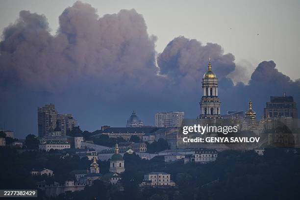 Smoke rises above Kyiv during a Russian strike on the Ukrainian capital on May 24 amid the Russian invasion in Ukraine. A large ballistic missile...