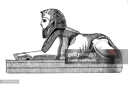 Crouching andro-sphinx statue representing a mythical creature with a lion body and human head Crouching andro-sphinx statue representing a mythical creature with a lion body and human head