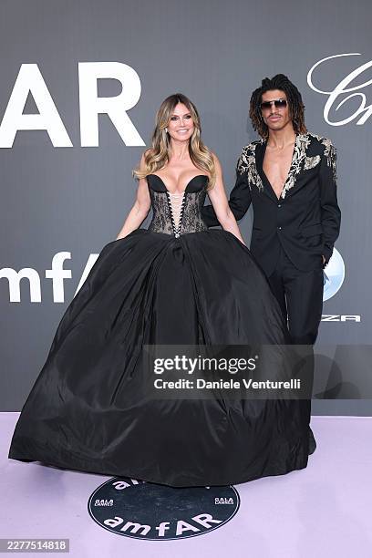 Heidi Klum and Henry Samuel attend the amfAR Gala Cannes 2026 presented by Chopard at Hotel du Cap-Eden-Roc on May 21, 2026 in Cap d'Antibes, France.