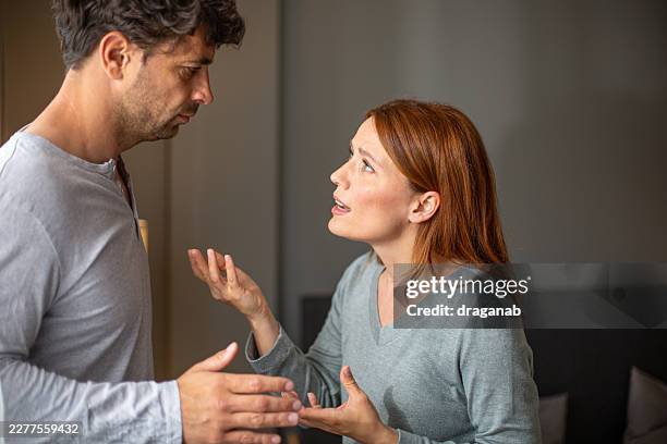 couple arguing having relationship problems and conflict - husband stock pictures, royalty-free photos & images
