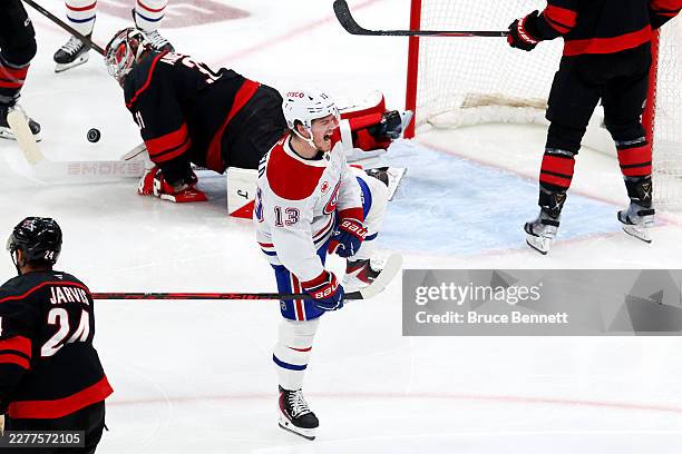 Cole Caufield of the Montreal Canadiens celebrates after scoring a goal against Frederik Andersen of the Carolina Hurricanes during the first period...