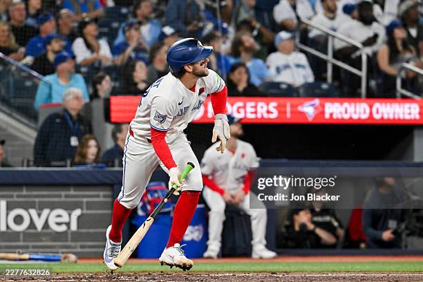 Ernie Clement of the Toronto Blue Jays hits a home run in the sixth inning during the game between the Miami Marlins and the Toronto Blue Jays at...