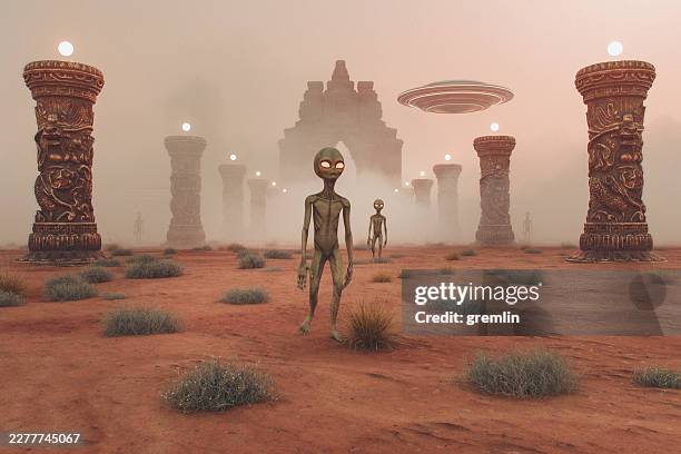 aliens walking on exo planet with old ruins - archaeology stock pictures, royalty-free photos & images