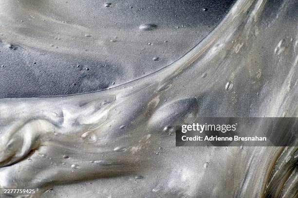 abstract metallic silver slime with bubble texture and flowing organic form - membrane stock pictures, royalty-free photos & images