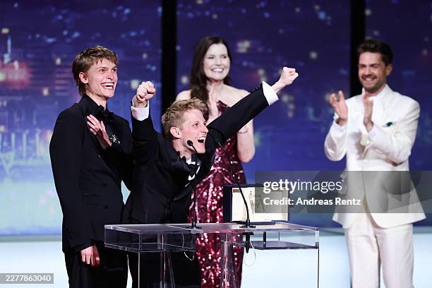 Emmanuel Macchia and Valentin Campagne accept the Best Actor Award for "Coward" on stage during the closing ceremony of the 79th annual Cannes Film...