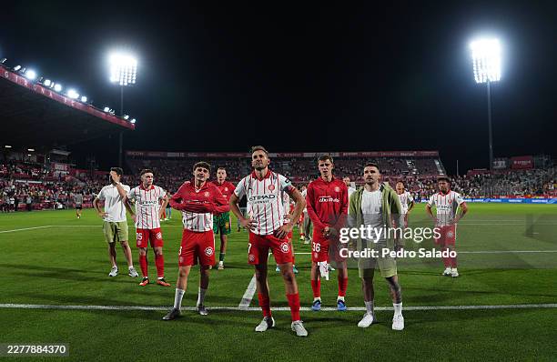 Players of Girona FC look dejected as they are relegated following the LaLiga EA Sports match between Girona FC and Elche CF at Montilivi Stadium on...