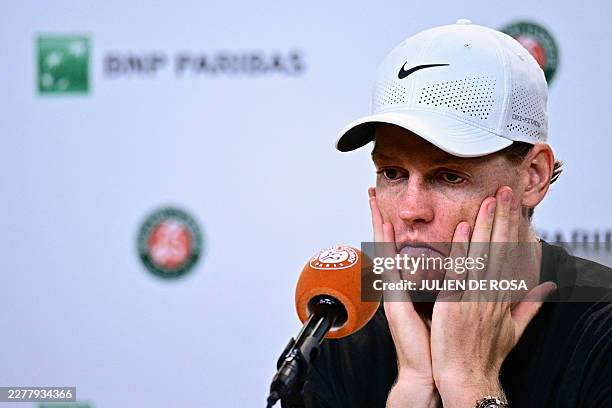 Italy's Jannik Sinner gives a press conference after being defeated by Argentina's Juan Manuel Cerundolo in their men's singles match on day 5 of the...