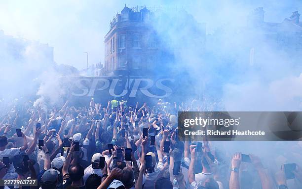 Fans set off flares as the Tottenham Hotspur team bus arrives at the stadium prior to the Premier League match between Tottenham Hotspur and Everton...