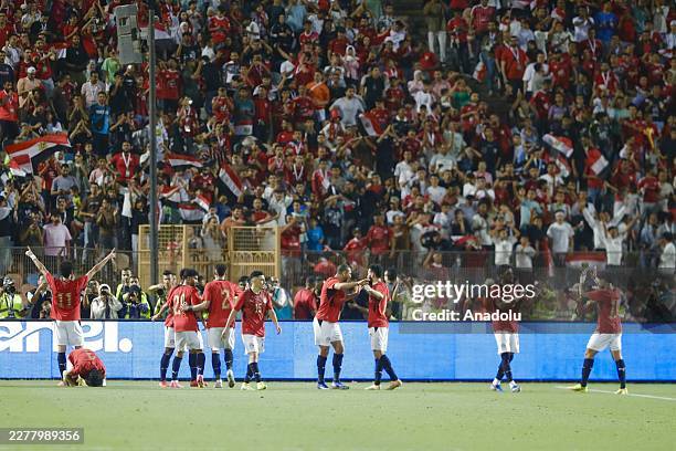 Mostafa Mohamed Zaki Abdelraouf of Egypt celebrates with his teammates after scoring a goal during the international friendly match between Egypt and...