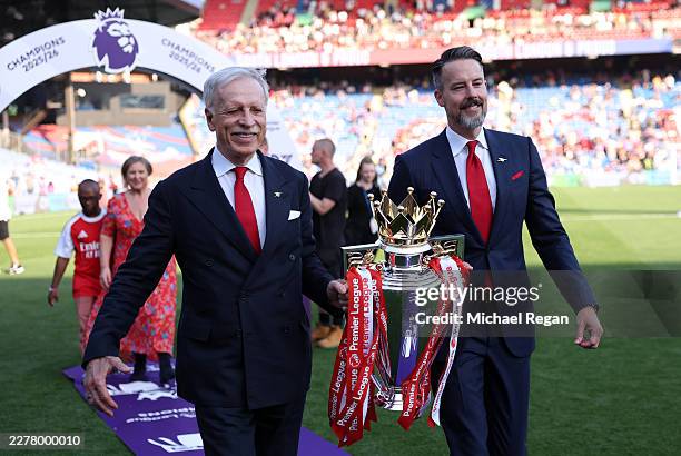 Josh Kroenke, Co-Chair of Arsenal, and Stan Kroenke, Owner of Kroenke Sports & Entertainment, present the Premier League trophy ahead of the...